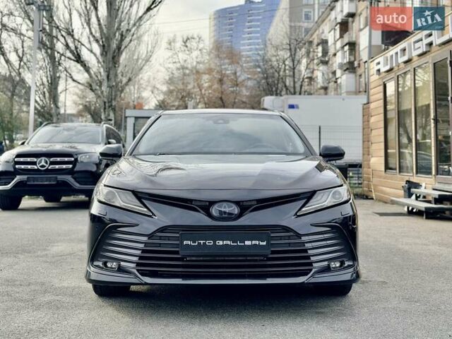 Черный Тойота Камри, объемом двигателя 2.49 л и пробегом 65 тыс. км за 39119 $, фото 1 на Automoto.ua