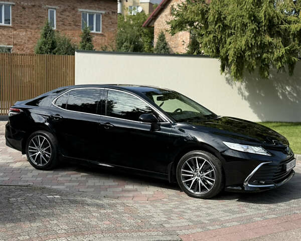 Черный Тойота Камри, объемом двигателя 2.49 л и пробегом 169 тыс. км за 31000 $, фото 1 на Automoto.ua