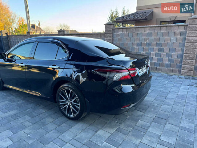 Чорний Тойота Камрі, об'ємом двигуна 2.49 л та пробігом 58 тис. км за 24500 $, фото 11 на Automoto.ua