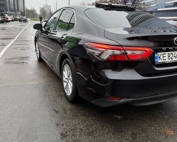 Черный Тойота Камри, объемом двигателя 2.49 л и пробегом 70 тыс. км за 29000 $, фото 1 на Automoto.ua