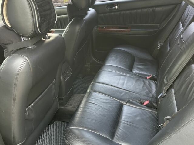 Черный Тойота Камри, объемом двигателя 2.4 л и пробегом 250 тыс. км за 6500 $, фото 22 на Automoto.ua