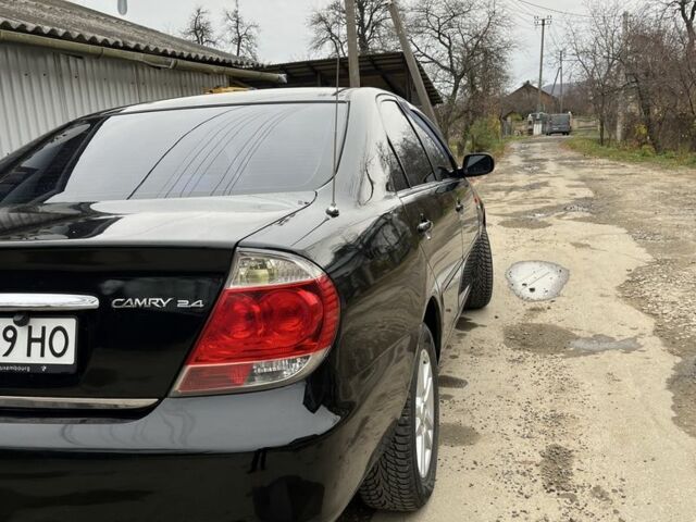 Черный Тойота Камри, объемом двигателя 2.4 л и пробегом 250 тыс. км за 6500 $, фото 18 на Automoto.ua