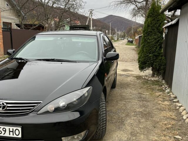 Черный Тойота Камри, объемом двигателя 2.4 л и пробегом 250 тыс. км за 6500 $, фото 8 на Automoto.ua