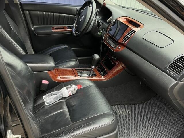 Черный Тойота Камри, объемом двигателя 2.4 л и пробегом 250 тыс. км за 6500 $, фото 12 на Automoto.ua