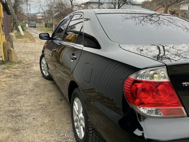 Черный Тойота Камри, объемом двигателя 2.4 л и пробегом 250 тыс. км за 6500 $, фото 20 на Automoto.ua