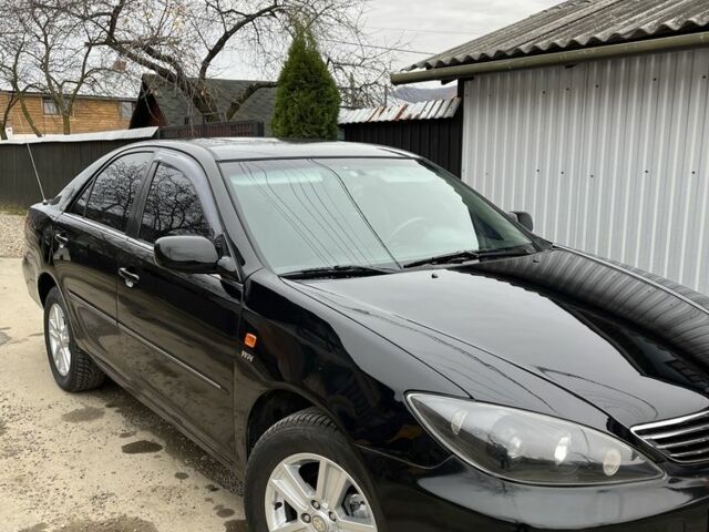 Черный Тойота Камри, объемом двигателя 2.4 л и пробегом 250 тыс. км за 6500 $, фото 7 на Automoto.ua