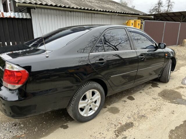 Черный Тойота Камри, объемом двигателя 2.4 л и пробегом 250 тыс. км за 6500 $, фото 19 на Automoto.ua