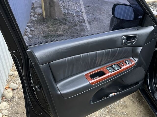 Черный Тойота Камри, объемом двигателя 2.4 л и пробегом 250 тыс. км за 6500 $, фото 2 на Automoto.ua