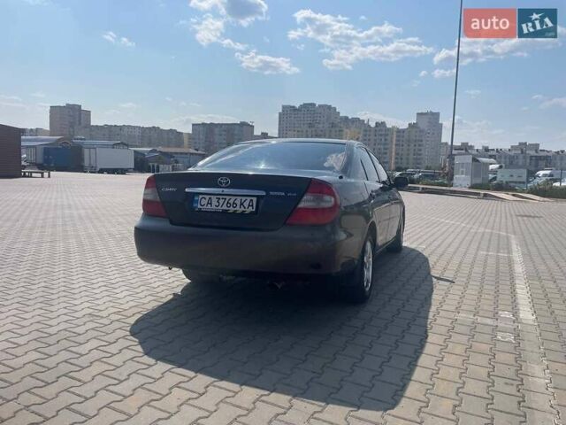 Коричневий Тойота Камрі, об'ємом двигуна 2.4 л та пробігом 320 тис. км за 4700 $, фото 2 на Automoto.ua