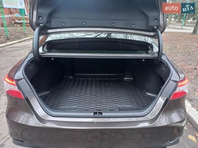 Коричневый Тойота Камри, объемом двигателя 2.49 л и пробегом 110 тыс. км за 21000 $, фото 7 на Automoto.ua