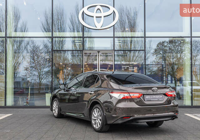 Коричневый Тойота Камри, объемом двигателя 2.49 л и пробегом 143 тыс. км за 21906 $, фото 1 на Automoto.ua