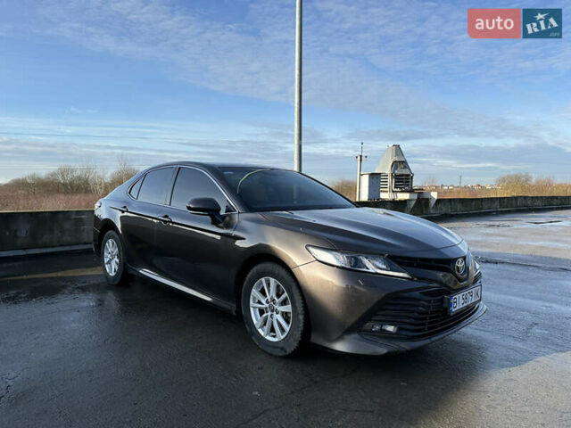 Коричневый Тойота Камри, объемом двигателя 2.49 л и пробегом 125 тыс. км за 19999 $, фото 7 на Automoto.ua