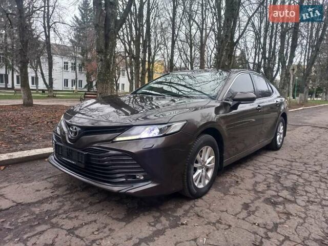 Коричневый Тойота Камри, объемом двигателя 2.49 л и пробегом 110 тыс. км за 21000 $, фото 2 на Automoto.ua