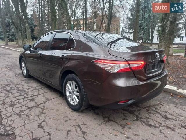 Коричневый Тойота Камри, объемом двигателя 2.49 л и пробегом 110 тыс. км за 21000 $, фото 4 на Automoto.ua