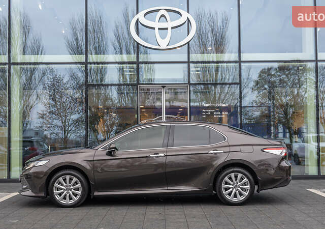 Коричневый Тойота Камри, объемом двигателя 2.49 л и пробегом 143 тыс. км за 21906 $, фото 2 на Automoto.ua