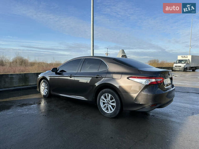 Коричневый Тойота Камри, объемом двигателя 2.49 л и пробегом 125 тыс. км за 19999 $, фото 3 на Automoto.ua