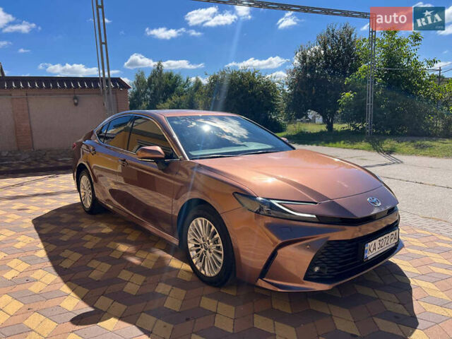 Коричневый Тойота Камри, объемом двигателя 2.49 л и пробегом 25 тыс. км за 34500 $, фото 1 на Automoto.ua