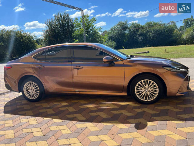 Коричневый Тойота Камри, объемом двигателя 2.49 л и пробегом 25 тыс. км за 34500 $, фото 2 на Automoto.ua