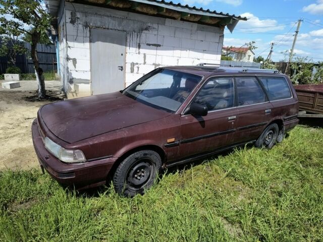 Коричневий Тойота Камрі, об'ємом двигуна 2 л та пробігом 435 тис. км за 744 $, фото 2 на Automoto.ua