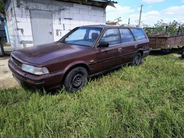 Коричневий Тойота Камрі, об'ємом двигуна 2 л та пробігом 435 тис. км за 744 $, фото 1 на Automoto.ua