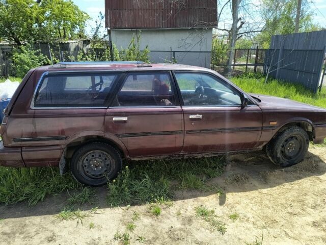 Коричневий Тойота Камрі, об'ємом двигуна 2 л та пробігом 435 тис. км за 744 $, фото 5 на Automoto.ua