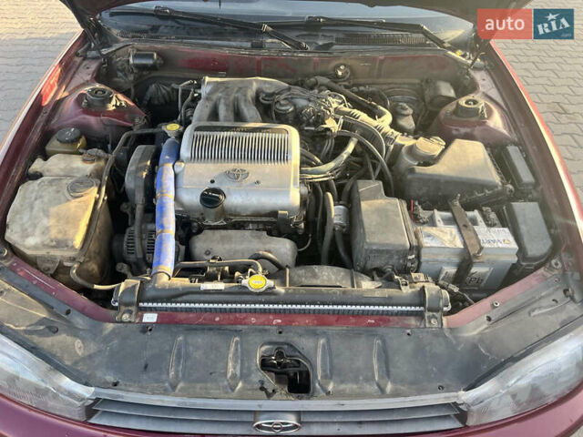 Червоний Тойота Камрі, об'ємом двигуна 2.96 л та пробігом 421 тис. км за 1200 $, фото 9 на Automoto.ua