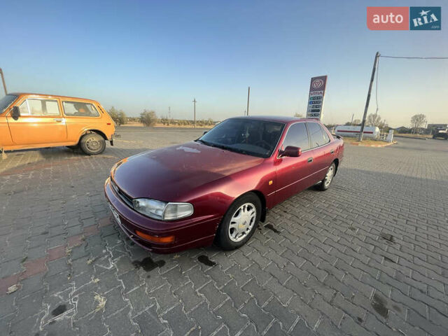 Червоний Тойота Камрі, об'ємом двигуна 2.96 л та пробігом 421 тис. км за 1200 $, фото 5 на Automoto.ua