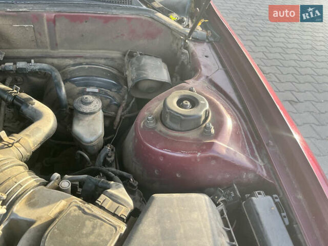 Червоний Тойота Камрі, об'ємом двигуна 2.96 л та пробігом 421 тис. км за 1200 $, фото 11 на Automoto.ua