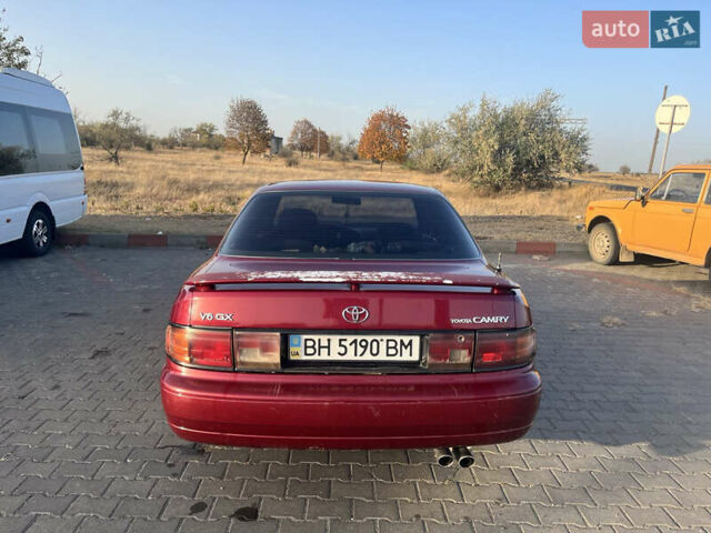 Червоний Тойота Камрі, об'ємом двигуна 2.96 л та пробігом 421 тис. км за 1200 $, фото 6 на Automoto.ua