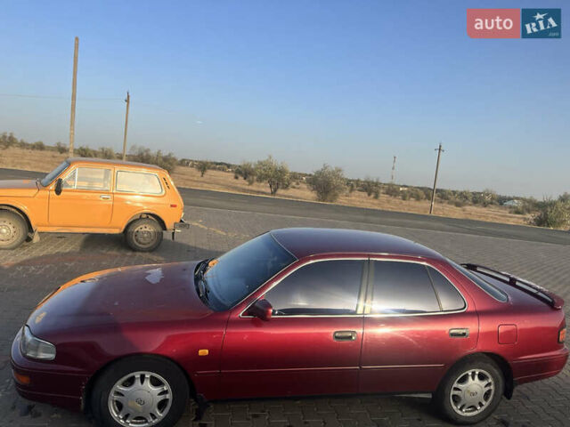 Червоний Тойота Камрі, об'ємом двигуна 2.96 л та пробігом 421 тис. км за 1200 $, фото 4 на Automoto.ua