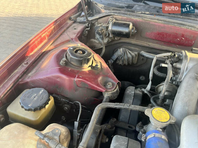 Червоний Тойота Камрі, об'ємом двигуна 2.96 л та пробігом 421 тис. км за 1200 $, фото 10 на Automoto.ua