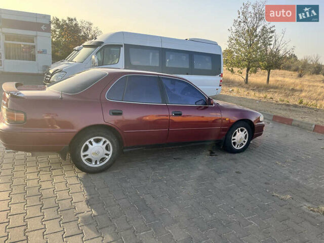 Червоний Тойота Камрі, об'ємом двигуна 2.96 л та пробігом 421 тис. км за 1200 $, фото 2 на Automoto.ua