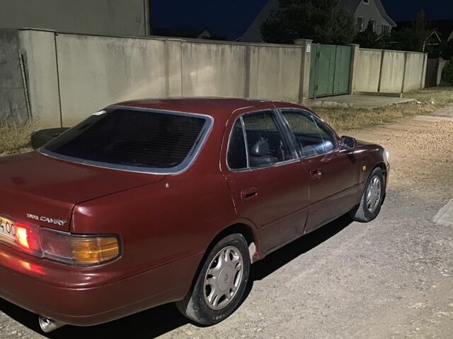 Червоний Тойота Камрі, об'ємом двигуна 3 л та пробігом 230 тис. км за 1450 $, фото 1 на Automoto.ua