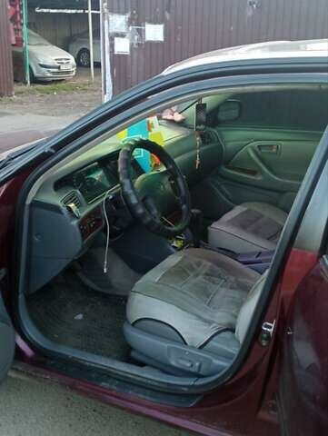 Красный Тойота Камри, объемом двигателя 3 л и пробегом 424 тыс. км за 4500 $, фото 1 на Automoto.ua