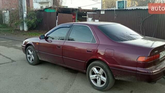 Красный Тойота Камри, объемом двигателя 3 л и пробегом 424 тыс. км за 4500 $, фото 11 на Automoto.ua