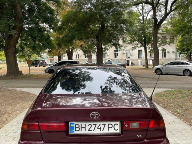 Красный Тойота Камри, объемом двигателя 3 л и пробегом 424 тыс. км за 4500 $, фото 3 на Automoto.ua