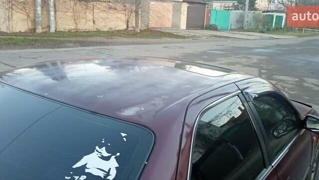 Красный Тойота Камри, объемом двигателя 3 л и пробегом 424 тыс. км за 4500 $, фото 9 на Automoto.ua