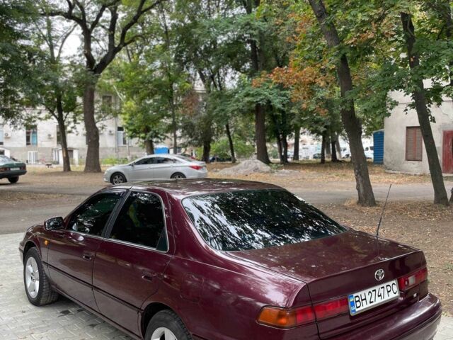 Красный Тойота Камри, объемом двигателя 3 л и пробегом 424 тыс. км за 4500 $, фото 1 на Automoto.ua