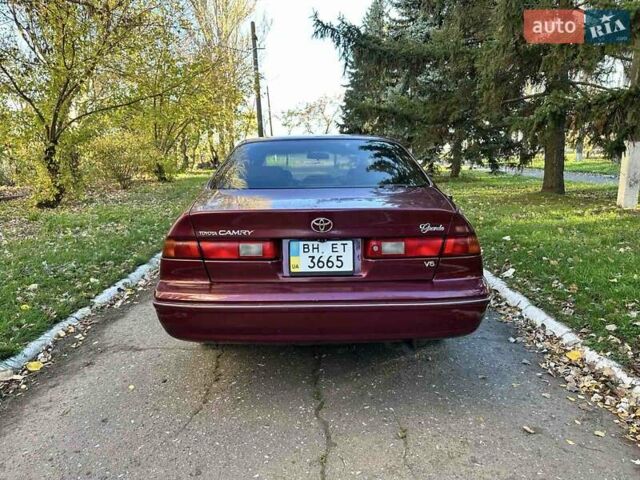Червоний Тойота Камрі, об'ємом двигуна 3 л та пробігом 340 тис. км за 2950 $, фото 4 на Automoto.ua