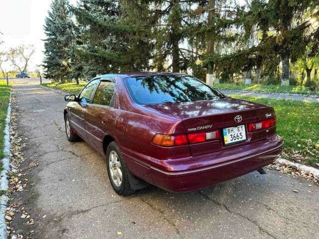 Красный Тойота Камри, объемом двигателя 3 л и пробегом 340 тыс. км за 2950 $, фото 5 на Automoto.ua