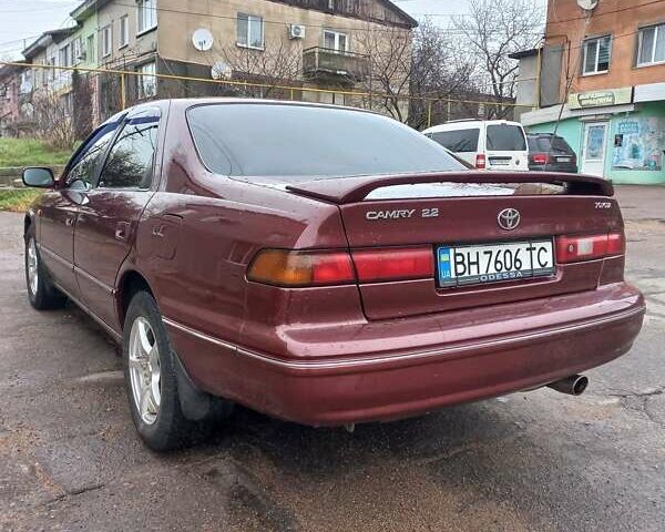 Красный Тойота Камри, объемом двигателя 2.16 л и пробегом 406 тыс. км за 3500 $, фото 4 на Automoto.ua