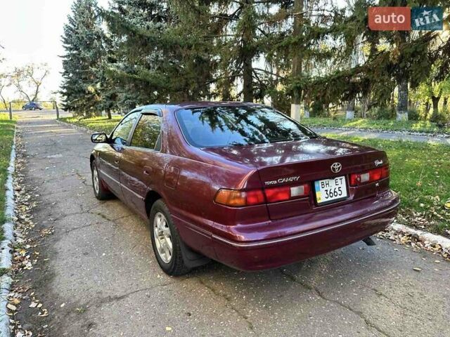 Червоний Тойота Камрі, об'ємом двигуна 3 л та пробігом 340 тис. км за 2950 $, фото 5 на Automoto.ua