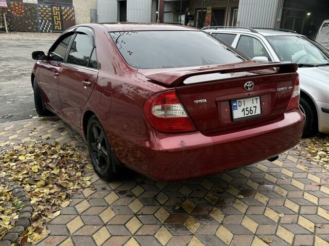 Красный Тойота Камри, объемом двигателя 2.4 л и пробегом 246 тыс. км за 4100 $, фото 8 на Automoto.ua