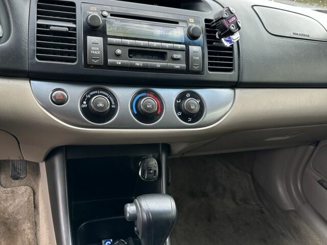 Красный Тойота Камри, объемом двигателя 2.4 л и пробегом 246 тыс. км за 4100 $, фото 19 на Automoto.ua