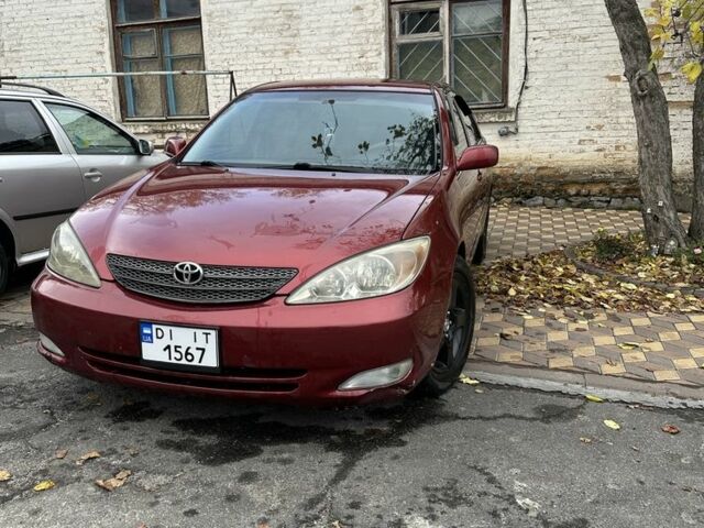 Красный Тойота Камри, объемом двигателя 2.4 л и пробегом 246 тыс. км за 4100 $, фото 2 на Automoto.ua