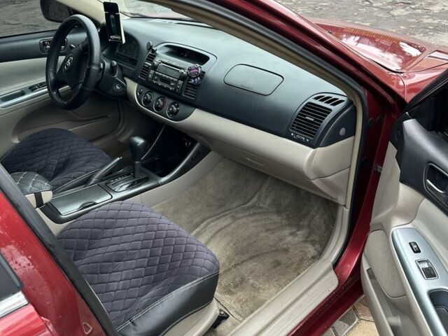 Красный Тойота Камри, объемом двигателя 2.4 л и пробегом 246 тыс. км за 4100 $, фото 16 на Automoto.ua