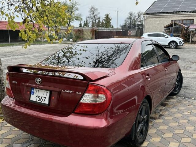 Красный Тойота Камри, объемом двигателя 2.4 л и пробегом 246 тыс. км за 4100 $, фото 12 на Automoto.ua