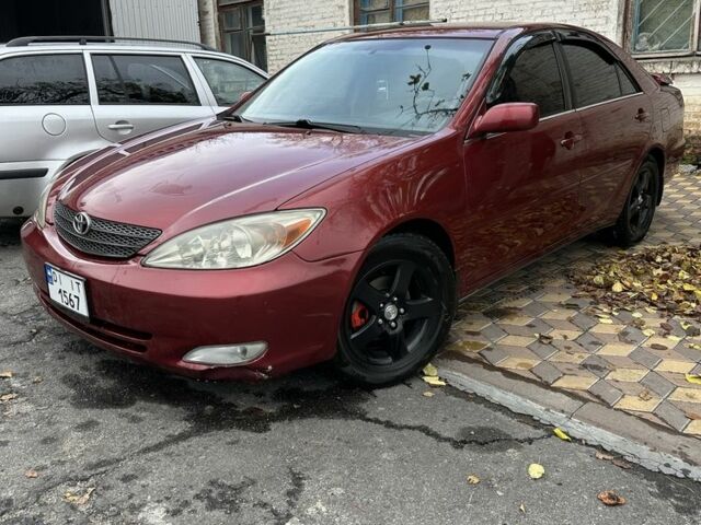 Красный Тойота Камри, объемом двигателя 2.4 л и пробегом 246 тыс. км за 4100 $, фото 6 на Automoto.ua