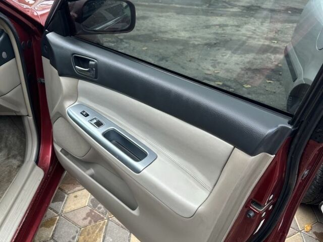 Красный Тойота Камри, объемом двигателя 2.4 л и пробегом 246 тыс. км за 4100 $, фото 18 на Automoto.ua