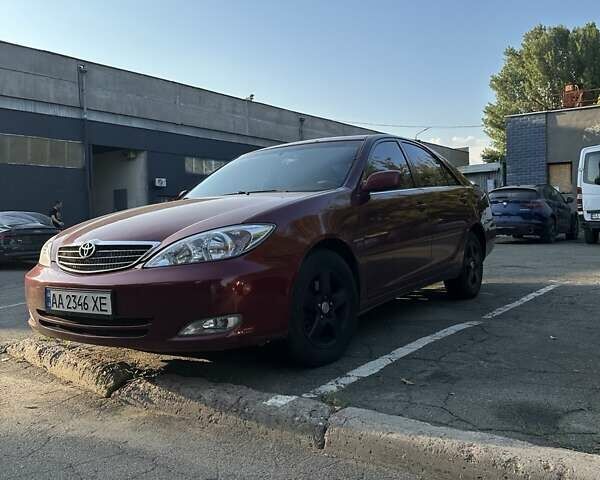 Красный Тойота Камри, объемом двигателя 3 л и пробегом 276 тыс. км за 5500 $, фото 4 на Automoto.ua